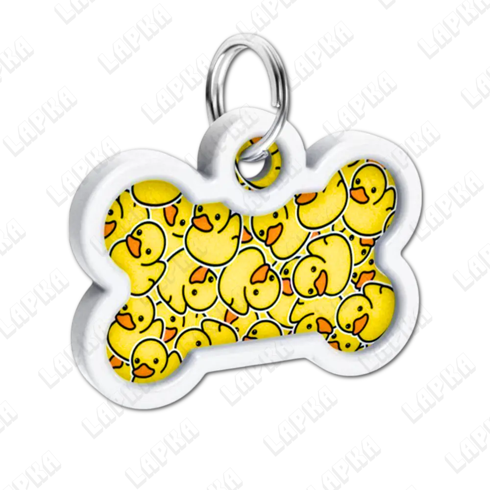 WAUDOG Smart ID QR Kachky Кісточка | Качки 2 WAUDOG Smart ID QR Kachky Кісточка | Качки - адресник з принтом для собак, під кутом, QR‑паспорт тварини на animal-id.net